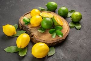 front-view-fresh-lemons-dark-background-fruits-lime-sour-citrus